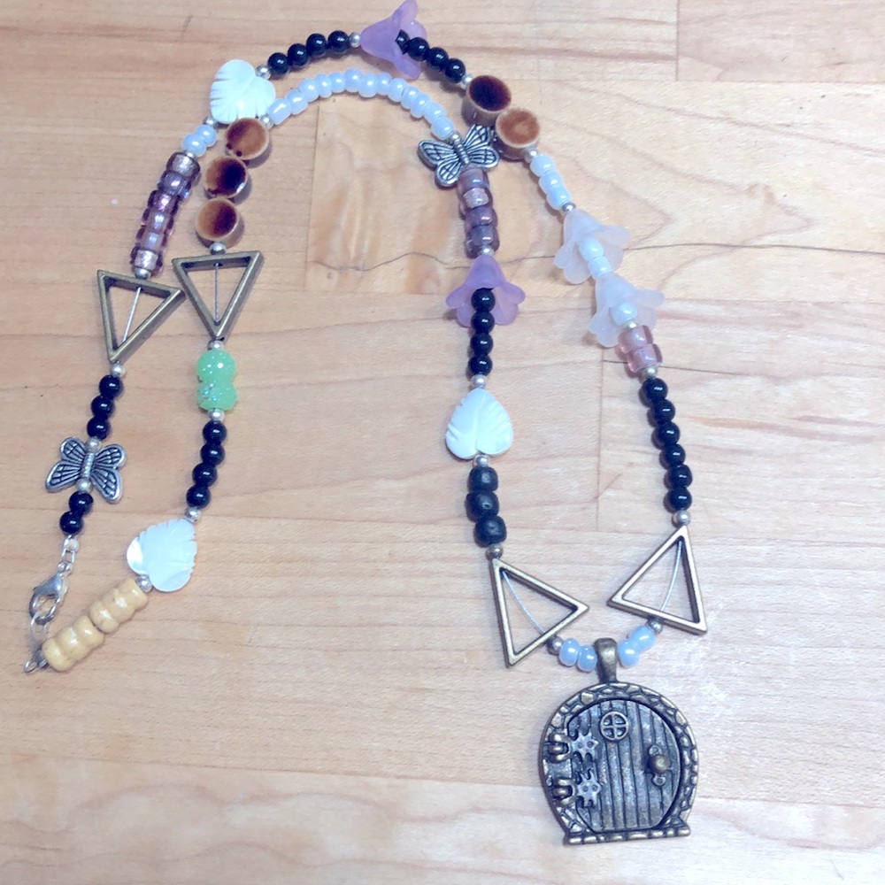Handmade cottagecore faerie necklace. Cute faerie door that opens. Witch vibes